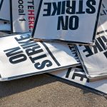 protest signs on ground